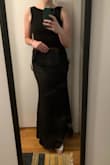 This dress is great! Such good quality for the price (its a nice thick material with a liner) and it fits really well. I usually wear a M/L in things and this dress fit perfectly. Its a little stretchy so I think the medium was a good call to fit my curves. It was not too low in the back and the length was good (maybe an inch or two off the ground). Wore it with heels, a sticky bra, and shape-wear type shorts. Perfect for a black tie wedding. - Kelly T.
