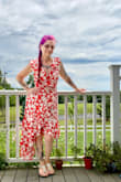 High-quality material on this gorgeous wrap dress. Incredibly fitting to your curves. I'm an A cup and you will need to either pin it closed or get tape to tape it to your bra. Otherwise, it will slide across your chest for smaller chested gal like myself. An easy fix though for how stunning this dress looks on a summer afternoon. Super simple to toss on with any hairstyle and a pair of sandals or heels. - Kandice M.