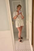 I bought this for our trip to Italy and it just screamed Capri to me! I was right! It's so pretty and stylish and comfortable as well. Not to short but I did add a safety pin to keep it closed. - Connie A.