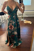The dress meets expectations, I am 5'1 and it is VERY long so I will have to get it altered. It's more wide and flowy on the bottom. The top fits great and has plenty of room for my boobs (I am a 30H bra.) The color is darker than online. - Nasreen W.