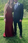 I LOVE this dress. I wore it as a wedding guest and received many compliments. It has just enough stretch and the material is thick. It was a little too long for me even though I am pretty tall so I would recommend wedges or heels if you are shorter. - Megan M.