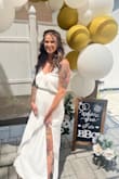 I bought this dress in black to wear to a wedding and I bought it in white to wear to my engagement party and both times I wore it I received so many compliments! It is so comfortable and it's easy to dress up or down! I am on the shorter side and with sandals, the bottom drags a bit but with heels had no problems! - Tiana D.