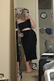 Fits like a glove- super stretchy and does not feel cheap. Fits true to size. I will likely have to wear shape ware underneath as it doesn't hold you in. I normally don't get items like this, but I'm glad I did! Also, The slit goes up on the side about mid thigh. - Anika H.