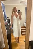 Fit perfectly! Has thick fabric underneath (not at all see-through thankfully) so it might look a little bigger but fits snug, and realistic to size. Wore for a backyard wedding. - Megan C.
