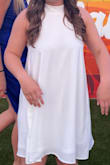 This dress was cute, super comfy, and I loved the pockets! But it runs big. I ordered a medium based on other comments which was already sized down but the arm hole/width around the bust was too large so it gapped. I probably would've tried a S if I had the time to swap sizes. Also while I loved the functionality of the pockets they were pretty noticeable in pictures based on the material of the top layer. - Katherine H.