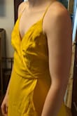 Really loved this dress, the shape, color, flirty, fun, and formal. It's great! The length, waist, hips, all of the mid-bottom fit wonderfully, the top, not so much... 'A/AA' Cups BEWARE!

If you want this one to work you will likely need to take it into a seamstress. I ordered my smaller size just to be sure I had a better chance of getting the top to work, but that was disappointing. I don't have enough time to get it into a seamstress before the event and there was no way of making the top portion work and look good without that extra work being done. The fabric for the ladies are like tents... A/AA Cups, you know what I mean. So much extra, there wasn't anything else I could do to make it work. I did have to return this dress due to the fit issue. Spare yourself the negative feelings, or be more prepared than I! - Jessica T.