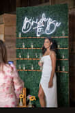 Cute dress, I wore it for my bridal shower and everyone loved it. The only thing is the slit runs high therefore I had to do a bit of alterations. - Nikki A.