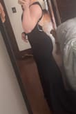 I haven't liked the way I've looked in a dress in a long time and this fit in the most flattering way imaginable. Thick material that holds you in and is smoothing but also shows off curves. Obsessed. So many compliments. I had to hem it because I'm short. But amazing dress. Flattering on the booty for sure. - Stephanie S.