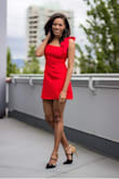 Loved how this dress fit. The bows were a nice touch and added some flair. Can't beat a little red dress. - Sierra S.