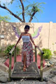 This skirt is amazing. It's so comfortable and versatile. I wore it to work on casual Friday with a fitted top and it was super cute and I recently wore it on a trip to Aruba. The center slit is sexy and the skirt has a lot of movement so it's super comfy. It travels well (no ironing needed) and it photographs great. Get the skirt. You'll LOVE it! - Irene C.