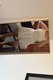 This is the perfect summer dress, helps fight the heat and looks great. I love how flowy it is and the material is great. It is on the shorter side but I don't mind. It does also run a little big but you can't notice, still so cute. - Jaelyn P.