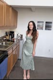 Love the color. Perfect to go to a summer wedding. A little big in the chest area but tight elsewhere. - Cheyenne T.