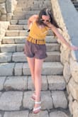 It was a cute little top to bring on vacation. Occasionally the tassels fell off but I hardly noticed because there are so many. So cute - Cheyenne T.