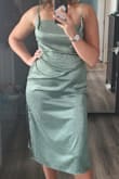 Probably could fit in M size, but I prefer loose fit so L size works great. Fabric is very thin and a little stretchy. Color is stunning. I had to adjust the decollte line, so I can bend over without showing anything extra (I'd you know that I mean. Got to tons of compliments. - Anna K.