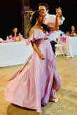 I'm 5' tall and ordered a medium size. It was a little long for me but after adjusting size, the dress fit me perfectly. It's comfortable, chic and very light to carry. Great material and color. The bust snap isn't quite functional but I was able to manage. Overall, it was a perfect dress for my first dance. - Anita S.