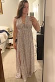 This dress fits beautifully, and it is absolutely what I hoped it would be! I bought this dress for a bachelorette weekend in the heat of summer, and I couldn't be happier. It is flowy, and the material is super airy and perfect for the heat, but best of all I love that I can get creative with how I tie the straps. Just have to hem it, but that was expected. If you're on the fence, I say go for it! - Liane H.