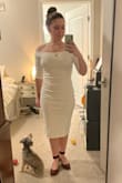 I ordered size S. This dress is a major win. I purchased this dress for my upcoming rehearsal dinner. It is sleek, elegant, and so flattering. It doesn't feel restrictive like some off-the-shoulder dresses can. The material is thick, so I don't have to worry about any see-through moments. Great quality, perfect fit. I can't wait to wear this! - Liane H.