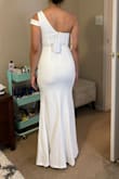 It is a beautiful dress, the quality of the fabric is beautiful and the measurements are perfect. - Paula P.