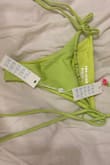 This swimsuit is the cutest thing. The charms are so adorable and the fabric is top tier. I always size up for frankie's bottoms just because they run a little small in my opinion. - Kathleen B.