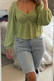 I really liked this too.  The color is beautiful and the style is super cute.  It's a tad on the short side but it's good with high-waisted jeans. - Payton S.