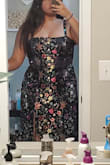 I love the material! There is a rubbery band at the top so it doesn't slip down. I love the slit!!! It was tight in the boob area tho. - Yasmine K.