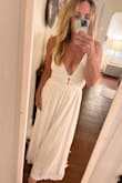 I love this dress. It is very flowy and romantic. I also purchased the bra tape to help keep everything in. - Noelle E.
