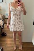 I wore this dress for my engagement party a few years ago and again recently for a garden party. The cut is very flattering in the bust and waist and material is very comfortable. - Miranda R.