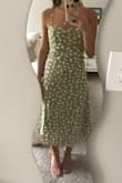 I had been eyeing this dress for a while, but it was always out of stock. When it was finally back in stock I was so excited and I'm happy to say it lived up to my expectations. It's the perfect midi length and the tie straps are easy to adjust. I got lots of compliments at the bridal shower I wore it to! - Amy A.