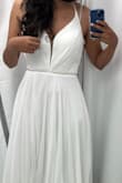 This dress was perfect for my elopement ceremony, it did come quite long so I had it shortened but everything else fit pretty well, the back is adjustable so that helped a lot to make it fit to my small chest and it has cups so you don't have to wear a bra with it (for guidance I am a size 4 or small at the top and a 6 for the bottom). The dress has multiple layers of fabric so it is not see through and is very good quality (you can feel it), the details at the bust look even better from up close. It is also quite breathable, we had our ceremony in the summer and it was not a problem at all. It was my first time ordering from lulu's and I was super impressed, it came quickly and the returns were easy. It looks a lot more expensive than what it is! - Dani U.