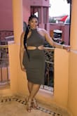 I loved the color & fit. I do have a small tummy, so wore with Spanx, but they wouldn't stay hidden lol! But, overall cute dress and I would suggest no Spanx! - Takiyah R.