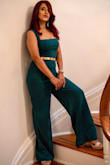 This has to be one of the most satisfying online purchases for clothes for me. Although the recommended size for a petite like me was XS but the jumpsuit ran quite long and required alteration. Other than that the piece is extremely pretty, fits me perfectly, and is very comfortable. The color is vibrant and the material is really good. - Purbitaa M.