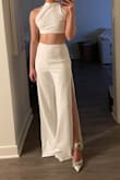I bought this for my bachelorette party and it is incredible! The top is a little big and the pants are too long, but easily tailored for the price. - Paige D.