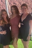 I really like this dress. The material is soft and the color is beautiful. The only issue I have is that the slit goes pretty high and the material under the dress isn't very long. All in all I love the dress! - April J.