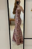 I ordered an XS and it was still a little large around the waist and chest. Bought this dress for a formal wedding and had to get it taken in. Now it fits like a glove and I'm very happy with it - Sarah M.