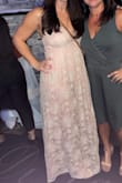 Wore this for my rehearsal dinner and it was stunning! Had to take some length off the bottom due to my height but otherwise I would change a thing about it! - Sarah H.