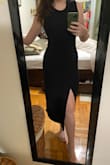 I love this dress! It's sooo comfortable. The fabric is a little thin on the bottom (it's double layered up top). It wasn't see-through from what I could tell, but I also don't have a large bottom that stretches the fabric. Because the fabric is thin, it's kind of delicate - and frays easily. My purse rubbed on the dress and made it pilly. So be careful. Other than that, I love it. - Andrea L.