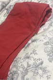 The web listing features a beautiful, saturated warm red but what I got was a muted, faded looking red.   These pants look like they've been washed quite a few times.  I suspect the web picture is colour-enhanced.   I am very disappointed.  Makes me wonder about pictures submitted with reviews (maybe color-enhanced with various photo editing apps).   I am now hesitant to order more because I fear the merchandise I will get will not look exactly as the web pictures.  Here's a picture of the pants I received. - Rowena S.