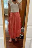 This skirt is perfect for small-waisted people especially if you're willing to let it sit a tiny bit lower. It's flowy and beautiful. - Madison S.