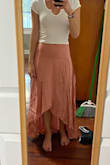 This skirt feels slightly classy but also summery and flowy. It's wrinkly but it works. It is a bit long like most Lulus skirts, but it sort of trails behind gracefully. I love it! - Madison S.