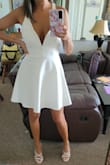 It is a beautiful dress but if you are smaller chested you might need double-sided tape to keep the dress from exposing your chi chis lol - Brittany C.