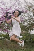 I purchased this dress for my graduation last year.
I love design and the dress is thick enough that it's not see-through. However, it's a little short on me, and I'm only 5'3". - Yearim Y.