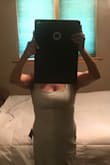 I have a bit of a donut belly so I can rarely wear a dress that is so fitted. Not only does it make my braless boobs look good, it somehow hides my belly! Ordered a small one and it's perfect. Color is true to the picture. Hem hits me about 4" above the knee. - Lisa S.