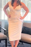I wore this dress for my bridal shower and I'm obsessed with this dress! The reviews helped me pick the best size, as it wasn't too tight but wasn't too big; fit perfectly! Highly recommend this dress to everyone! - Ashton E.