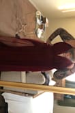 I absolutely loved this dress. Since I'm rectangle shaped with small chest, a 2x fit my waist perfectly but the bust was too big. If I had the time to exchange it for a 1x, I would've definitely done so. The length was super long even with 5 inch heels. Definitely need some tailoring unless you're 5'10 or taller. Overall, it was comfortable, breezy, and feminine. - Priscilla S.