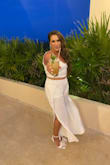 I wore this in Cancun for my bachelorette and it was the perfect combo of bridal but sooooo fun. The pants have a high slit on both legs so I didn't get too hot and the shorts under covered even my big booty.  I felt like the pants were very slimming and perfectly high waisted. I didn't have to get them hemmed because I am taller but I did wear a small heel. The top is super cute and adjustable so you can make it tighter or looser depending on your bust. I got a ton of compliments on this and I can't wait to wear it again! Buy this! - Jenna R.