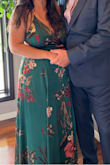 Absolutely stunning color and print in person. I received so many compliments on this dress all night. At first I was worried about the fabric being heavy, but it was silky and luxurious feeling.

I wore this for a hot July wedding and danced all night in it. The fabric was cooling and the slit was cut just the right length.

Adjustable straps helped me to customize the way the top fit and was very comfortable. The dress is quite long and I had 3 inch heels on and it skimmed the floor. - Sarina W.