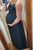 I bought this dress in both the green and yellow. Both fit amazing! Comfortable and non restrictive on my belly. It's hard to find a dress during pregnancy thats both bump friendly and very flattering! I also love that the straps are easily adjustable and the clasp is sewn on very well for durability. I would recommend this dress for both pregnant and non pregnant women - Suze V.