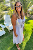 I wore this trip on a trip to Croatia, Italy and Turkey and the color was gorgeous against the Mediterranean back drops. I had to size up from L to XL as the top is fitted and the material and zipper back are not forgiving. I usually wear a size 10. The dress was also great for travel as I was able to hand wash and hang dry overnight in hotels, making it a great piece for long trips. I was able to wear it in 3 different countries I visited on my trip! - Saroja W.