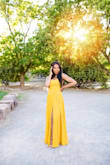 This dress worked out perfectly for my senior pictures. I did have to clip the back a little. From that I know I would get a smaller size next time, but other than that it was amazing! The dress was nice and flowy. Easy it move in, especially when I was taking pictures in areas that are tough to walk through. 
Overall, I felt like the belle of the ball!

Photo creds: Anchoredmemory.com - Julie E.