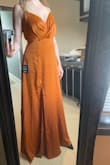 I love the crushed satin fabric of this dress and was really bummed it didn't work for me. The top felt like I didn't quite fill it out and it looked a little awkward. Would have been perfect for a fall wedding.
In 3" heels, this hit the floor on me. - Erin W.